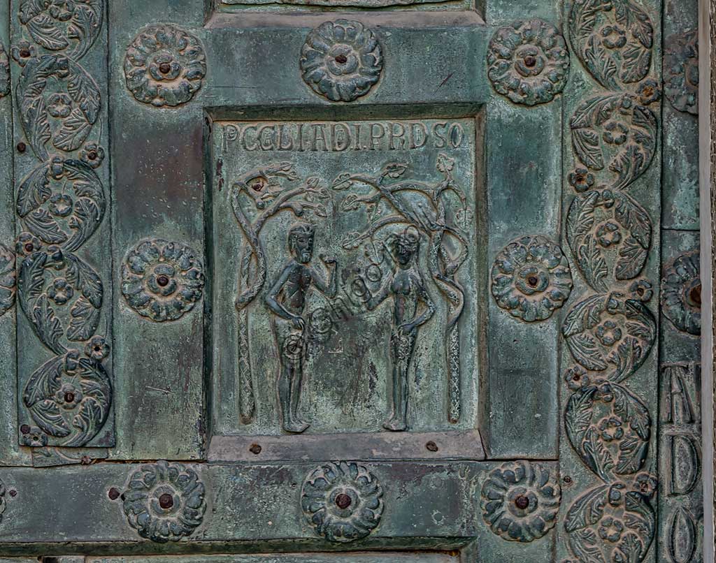  Monreale Cathedral, the gate by Bonanno Pisano (1185-6): bronze tile depicting "The Original Sin" (scene of the Old Testament).The gate is signed "Bonanno civis pisanus". It depicts five scenes of the Old Testament at the bottom, starting with Adam and Eve, and five scenes of the New Testament at the top, ending in "Christ and Mary in the glory of Paradise".