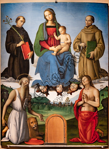 Perugia, Galleria Nazionale dell'Umbria: Pala Tezi, di Pietro di Cristoforo Vannucci, detto il Perugino,1500, olio su tavola. La Madonna con Bambino è circondata dai Santi Nicola da Tolentino, Bernardino da Siena, Girolamo, Sebastiano. Ai suoi piedi teste di cherubini. 