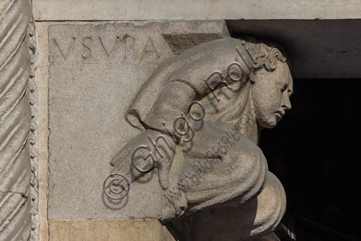 Piacenza, the Cathedral (Duomo), façade, main portal: epistyle corbel with allegory of usury (interest).