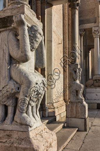 Piacenza, the Cathedral (Duomo): telamon of the left portal.