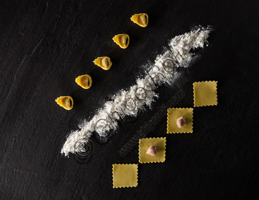  A plate showing the preparation of tortellini (a kind of Italian first course) and flour.