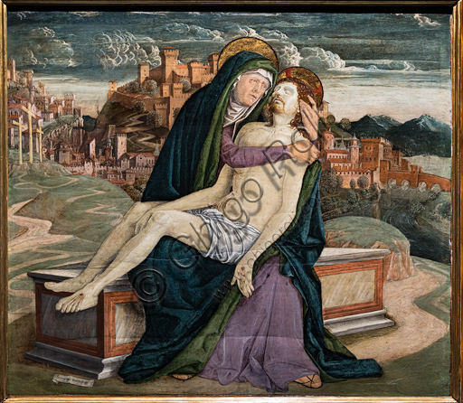 “Pietà”,  di Gerolamo da Treviso il Vecchio, 1495-7 circa. Sullo sfondo una cittadina fortificata che potrebbe rappresentare un borgo veneto come Soave o Marostica. 