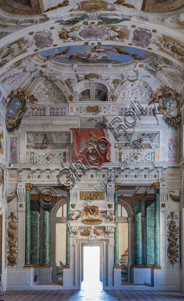 Sassuolo, Este Ducal Palace; Hall of the Guards: the ceiling of the hall with the “Bologna Quarters” by Angelo Michele Colonna, Agostino Mitelli, Baldassarre Bianchi and Gian Giacomo Monti. At the centre: "The Muses present to Apollo the literary works promoted by the Dukes of Este”. View towards the South West wall.