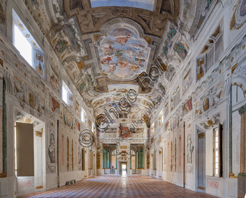 Sassuolo, Este Ducal Palace; Hall of the Guards: the ceiling of the hall with the “Bologna Quarters” by Angelo Michele Colonna, Agostino Mitelli, Baldassarre Bianchi and Gian Giacomo Monti. At the centre: "The Muses present to Apollo the literary works promoted by the Dukes of Este”. View towards the North East wall.