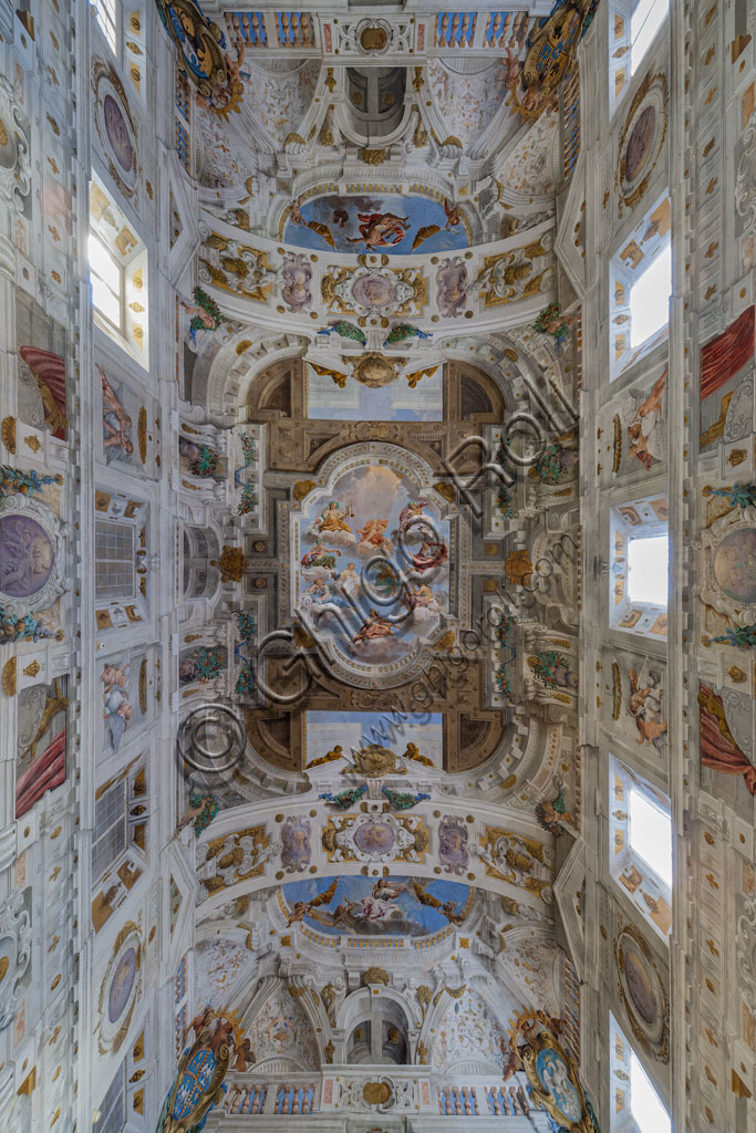 Sassuolo, Este Ducal Palace; Hall of the Guards: the ceiling of the hall with the “Bologna Quarters” by Angelo Michele Colonna, Agostino Mitelli, Baldassarre Bianchi and Gian Giacomo Monti. At the centre: "The Muses present to Apollo the literary works promoted by the Dukes of Este”.