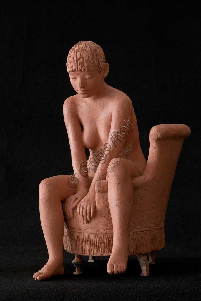 Assicoop - Unipol Collection:  Vittorio Magelli  (1911-1988); "Girl sitting on an Armchair"; Earthenware sculpture; h. cm. 125.