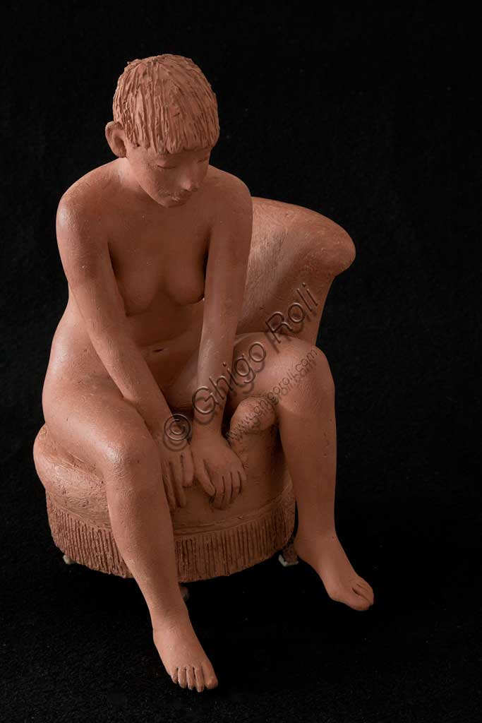Assicoop - Unipol Collection:  Vittorio Magelli  (1911-1988); "Girl sitting on an Armchair"; Earthenware sculpture; h. cm. 125.