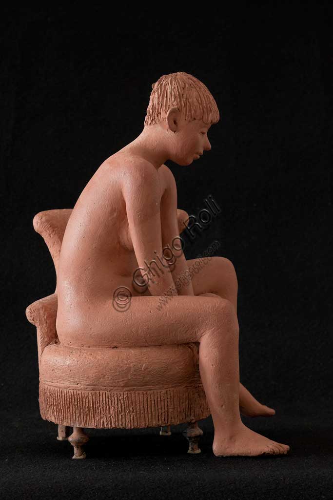 Collezione Assicoop Unipol:  Vittorio Magelli  (1911-1988); "Ragazza seduta su Poltrona"; terracotta, h. cm. 39.