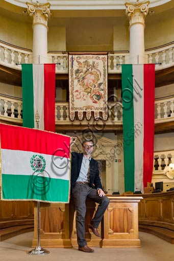 Reggio Emilia, the Town Hall Palace, the Council Room: Graziano Del Rio, mayor, beside the Italian flag.