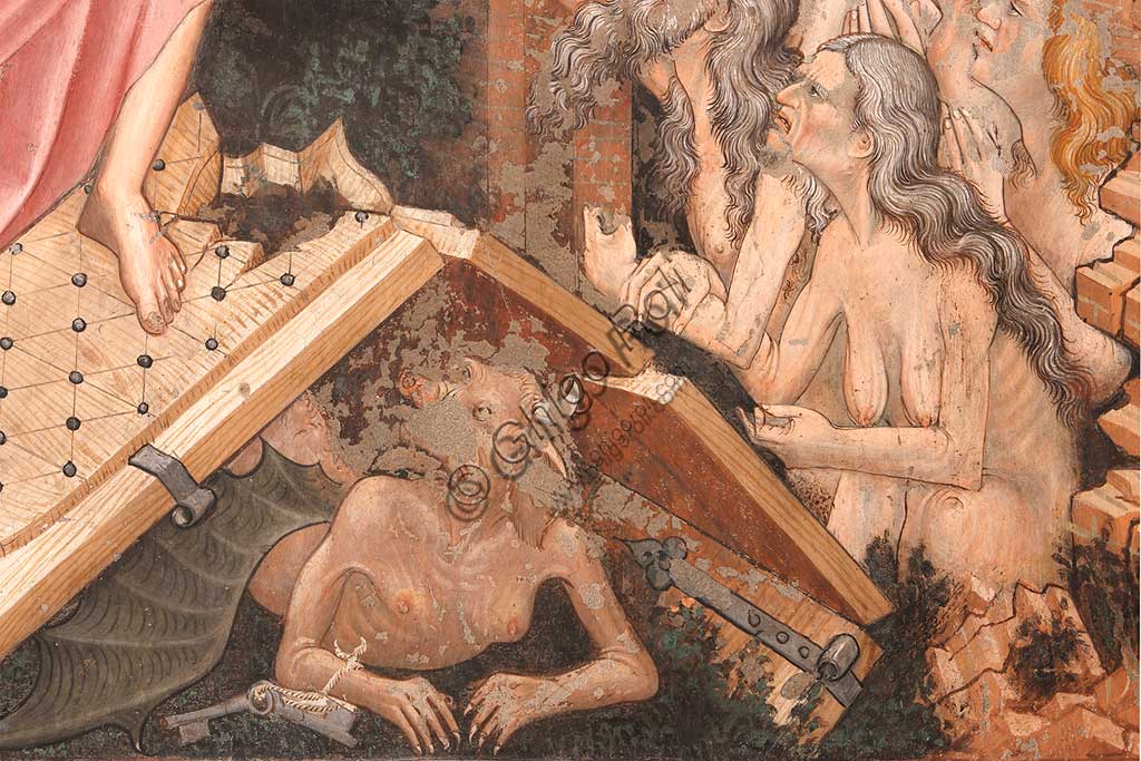 Vignola Stronghold, the Contrari Chapel, Northern wall: "Resurrection" and "Descent into Limbo", fresco by the Master of Vignola, about 1420. Detail of the "Descent into Limbo": the gates of Hell and the figure of the Devil on the ground.
