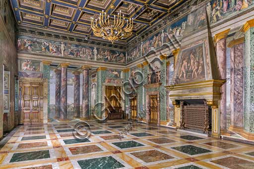 Rome, Villa Farnesina: The Hall of Perspectives, representing views of Rome. Frescoes by Baldassarre Peruzzi (1518-9). It represents the ideal continuation of the ground floor loggias; through the imitation columns one can see various views: villages perched on rock, countryside views, and in the background, against an illuminated sky, is the city (The Holy Spirit Church, a Roman basilica, the porta Settimiana).