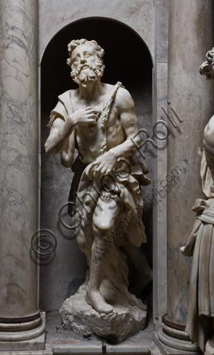 Genoa, Duomo (St. Lawrence Cathedral), inside, Cybo chapel (northern arm of the transept), Funerary Monument of Archbishop Giuliano Cybo: from the left, "St. John the Baptist ", statue by Giangiacomo and Guglielmo Della Porta, and by Niccolò Da Corte (1533 - 1537). 