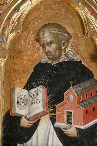   San Severino Marche, Pinacoteca Comunale: Paolo Veneziano, Polyptych (1358) with Saints. Detail of St. Thomas Aquinas holding a church in one hand and a book in the other one.
