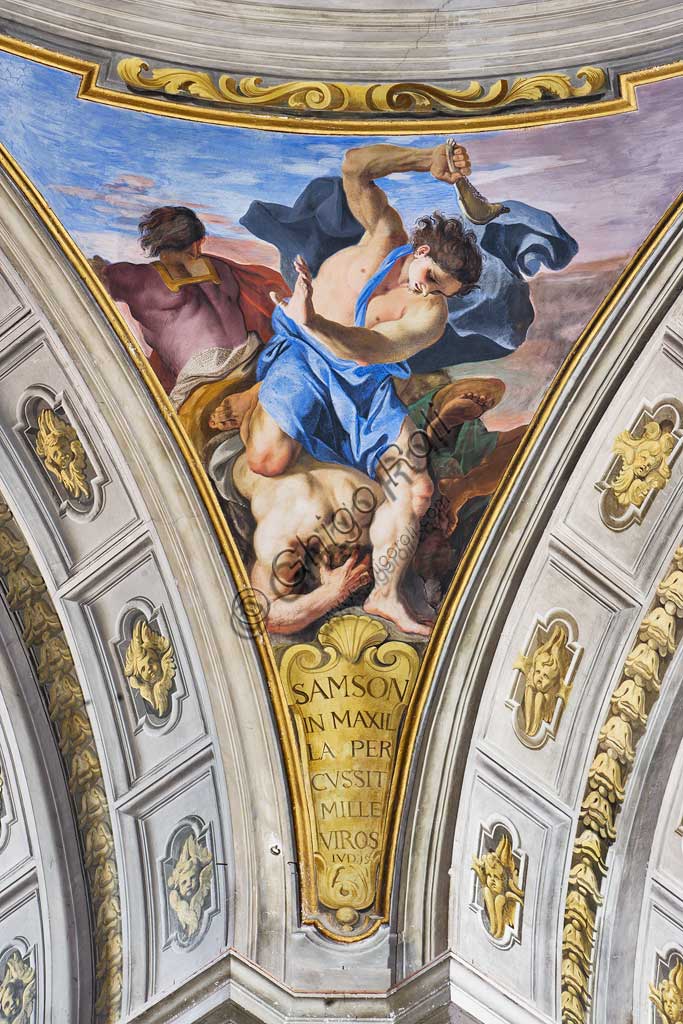 Rome, S. Ignazio Church, interior: detail of one of the pendentives of the false dome of the transept: "Samson slaying a thousand Philistines with the jawbone of a donkey ", fresco by Andrea Pozzo, 1685.