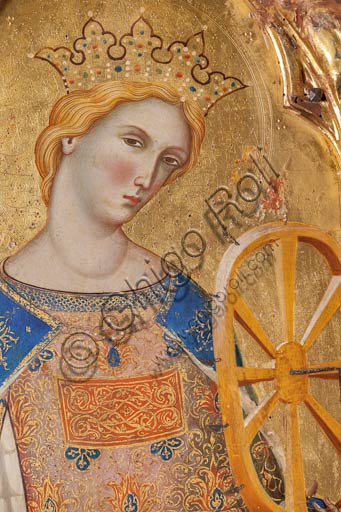   San Severino Marche, Pinacoteca Comunale: Paolo Veneziano, Polyptych (1358) with Saints. Detail of St. Catherine of Alessandria holding the torture wheel.