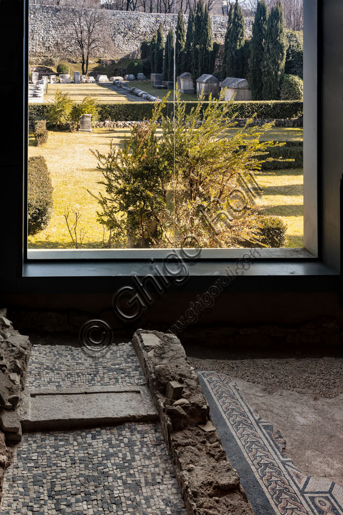 Brescia, "Santa Giulia, Museum of the City" (Unesco site since 2011), one of the Roman domus of Ortaglia: detail of the mosaic floor of the Chamber of the Columns and the adjacent garden of the Monastery.