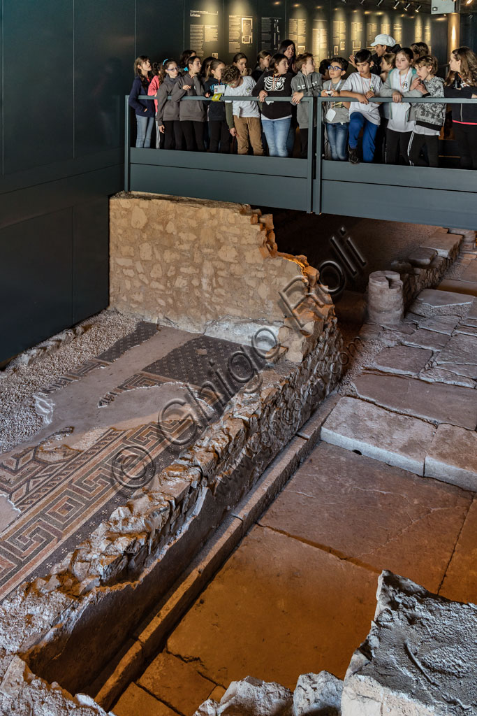 Brescia, "Santa Giulia, Museum of the City" (Unesco site since 2011): some children of a school group visit one of the Roman domus of Ortaglia.