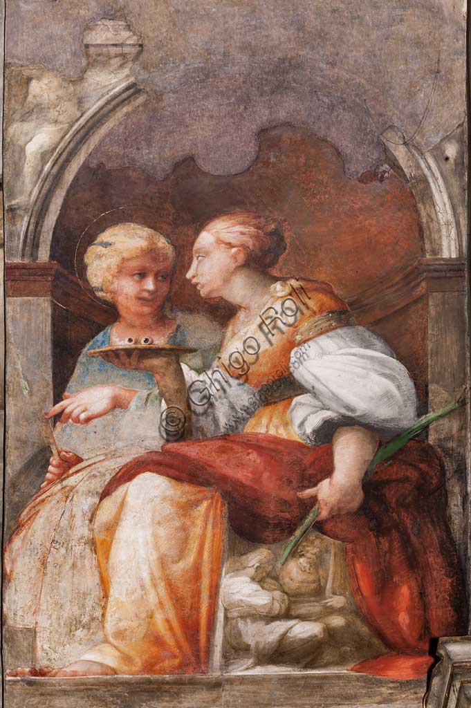 Parma, Chiesa di San Giovanni Evangelista, navata sinistra, prima cappella : "Santa Lucia e Sant'Apollonia", affresco  di Girolamo Francesco M. Mazzola  (il Parmigianino) (circa 1523). 