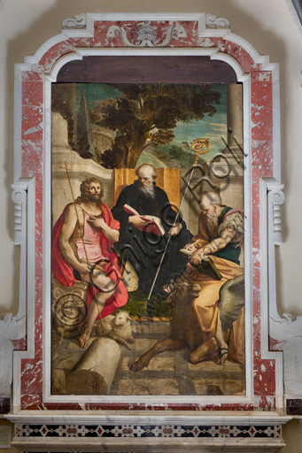 Genova, Duomo (Cattedrale di S. Lorenzo), Interno, Battistero (già Chiesa di San Giovanni il Vecchio): "I Santi Benedetto, Giovanni Battista e Luca", di Luca Cambiaso, olio su tavola, 1562.