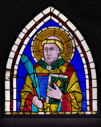 Basilica of the Holy Cross: " A Saint Deacon Martyr",  early XIV century, by Giotto, stained glass window panels.