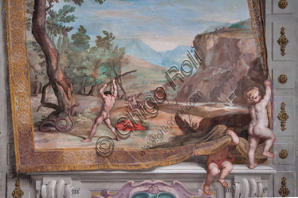 Sassuolo, Este Ducal Palace, the Bacchus Gallery: "Bacchus fighting with the snake sent to him by Juno". The faux tapestry with the vast rocky landscape is lifted by a putto who remains partially hidden by it, while to the side, another putto holds onto the edge. In the foreground, left in front of a large tree, Bacchus strikes the snake that sent Juno against him with a vine branch. It is one of the forty-one panels with scenes painted by Jean Boulanger which narrate the events of Bacchus. Wall tempera painting, 1650 - 52.Detail.