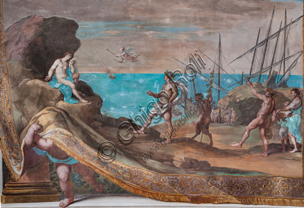 Sassuolo, Este Ducal Palace, the Bacchus Gallery: “Bacchus reaches Ariadne abandoned by Theseus on the island of Naxos”. The faux tapestry raised by a putto which remains almost totally hidden by it, depicts a seascape dominated by a rock on which Ariadne sits. On the right, Bacchus tries to console her for Theseus' flight; behind him some satyrs and ships. It is one of the forty-one panels with scenes painted by Jean Boulanger which narrate the events of Bacchus. Wall tempera painting, 1650 - 52.