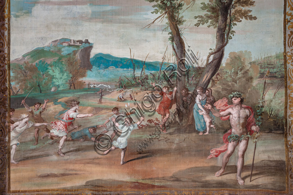 Sassuolo, Este Ducal Palace, the Bacchus Gallery: “Lycurgus made mad by Bacchus”.The painting with the vast landscape depicts, in front of a large double tree, Lycurgus, king of the Edonians, driven mad by Bacchus for having the vines cut down in his kingdom. The king is playing with a group of children while Bacchus watches the scene. It is one of the forty-one panels with scenes painted by Jean Boulanger which narrate the events of Bacchus. Wall tempera painting, 1650 - 52.