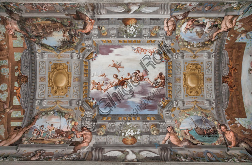 Sassuolo, Este Ducal Palace, the Bacchus Gallery, ceiling: “Wedding Banquet". On the clouds  Bacchus, Ariadne and Venus with a figure pouring wine are seated at a round table. The other gods watch from afar.“. Wall tempera painting by Jean Boulanger, 1650 - 52.