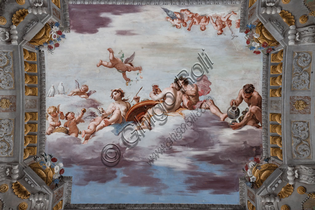 Sassuolo, Este Ducal Palace, the Bacchus Gallery, ceiling: “Wedding Banquet". On the clouds  Bacchus, Ariadne and Venus with a figure pouring wine are seated at a round table. The other gods watch from afar.“. Wall tempera painting by Jean Boulanger, 1650 - 52.