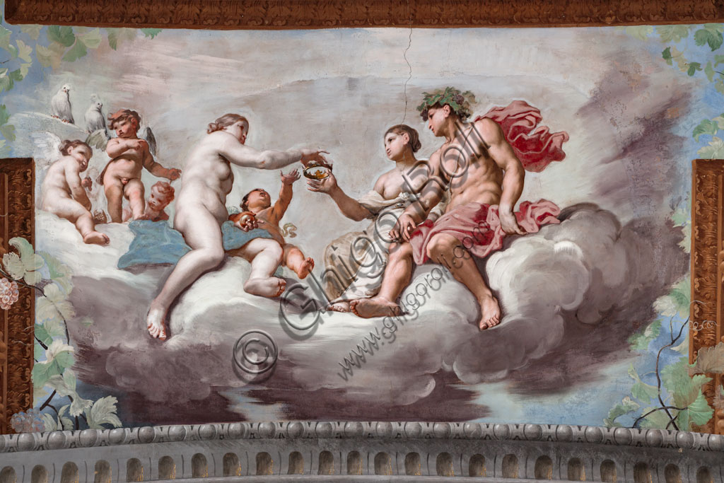 Sassuolo, Este Ducal Palace, the Bacchus Gallery, ceiling: “Venus gives the crown to Ariadne”; on the clouds Venus, surrounded by cupids, offers the crown of Vulcan to Ariadne seated next to Bacchus.Wall tempera painting by Jean Boulanger, 1650 - 52.