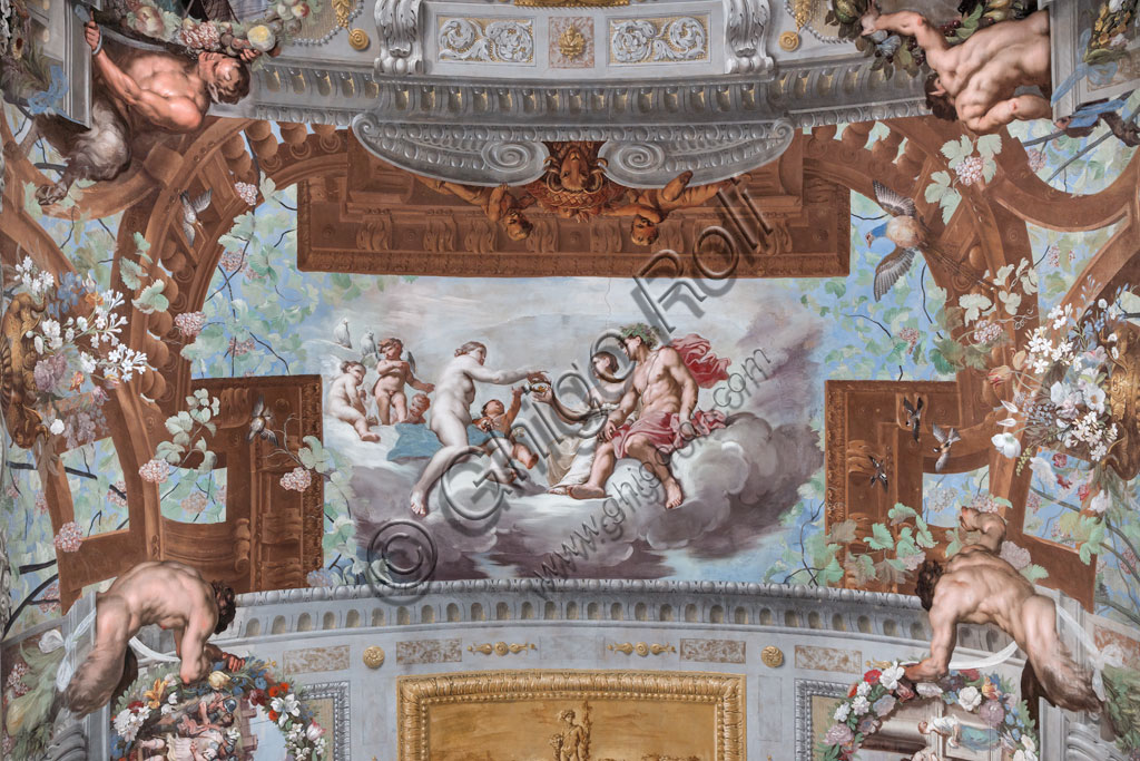 Sassuolo, Este Ducal Palace, the Bacchus Gallery, ceiling: “Venus gives the crown to Ariadne”; on the clouds Venus, surrounded by cupids, offers the crown of Vulcan to Ariadne seated next to Bacchus.Wall tempera painting by Jean Boulanger, 1650 - 52.