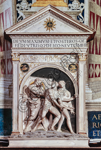 Siena, Duomo (Cathedral): stucco aedicule with high-relief, an old copy of the “Expulsion from the Garden of Eden”, sculpted by Jacopo della Quercia for the Fonte Gaia.