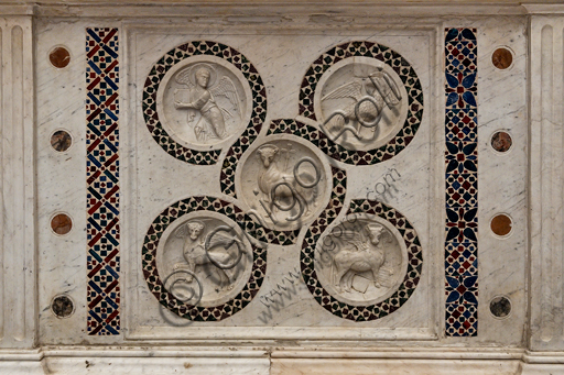  Spoleto, St. Euphemia Church: precious 12th century altar marble frontal, characterised by the Agnus Dei and the symbols of the Evangelists and decoration with Cosmatesque mosaics.