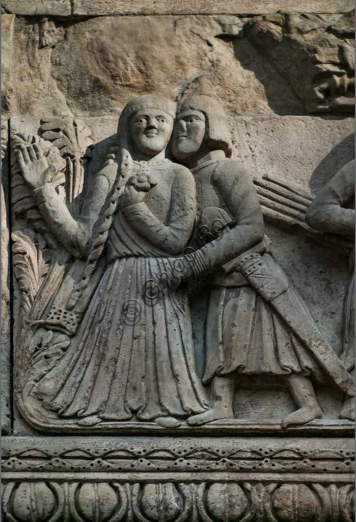 Fidenza, Duomo (St. Donnino Cathedral), Façade: the bas-relief with Stories of Berta, Milone and Rolandino", detail with Milone seducing Berta. Work by Benedetto Antelami and his workshop.