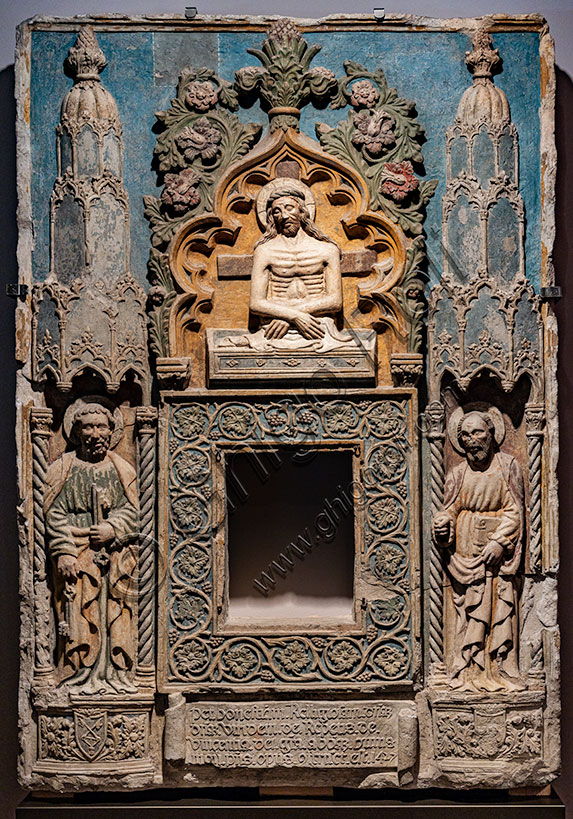 “Tabernacle of the Blessed Sacrament with Christ in the tomb between St. Peter and St. Paul”, by school of Antonino da Venezia, 1427, painted colombine stone.