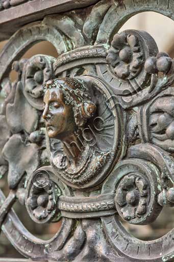 Bergamo, Città alta, Cappella Colleoni (Colleoni Chapel), iron wrought gate realised by Vincenzo Muzio in 1912, according to a drawing by Gaetano Moretti: detail with a woman's head.