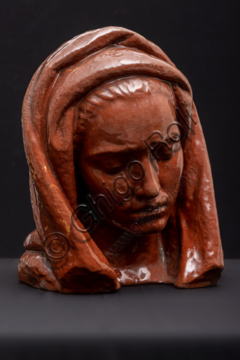Collezione Assicoop - Unipol: Arrigo Minerbi (Ferrara 1881-1960); "Testa femminile con velo"; terracotta invetriata, cm 34x26x26.