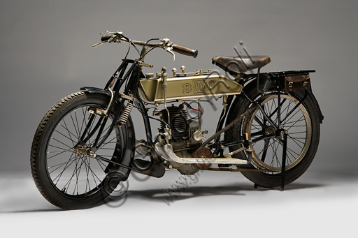 Vintage BMP Type Sport motorcycle.Brand: Soc. Brevetti Malasagna Pinerolomodel: Sport typecountry: Italy - Turinyear: 1921conditions: restoreddisplacement: 239 cc. (bore and stroke 66 x 70)engine: single-cylinder two-stroke gearbox: four ratios split between a gearbox and a reducer with coaxial control on the tank and final belt transmissionEmilio Malasagna is active in Pinerolo with his brother, starting from 1920. He produces motorcycles from 1920 until '24. Some technical characteristics, as well as the place of production, suggest that this bike, like the others built by BMP and very similar to this one, was designed especially for climbs. Its peculiar characteristics that suggest a particularly heavy use are the large and deep finning of the cylinder, the lubrication system which, in addition to the use of a 10% mixture, also included a pump for the extra drip oil, but above all the particular type of two-speed gearbox.