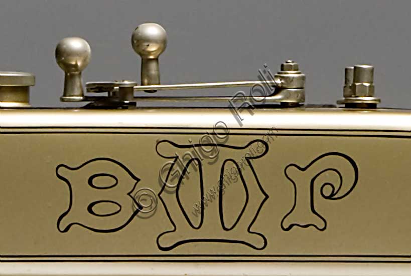 Vintage BMP Type Sport motorcycle.Brand: Soc. Brevetti Malasagna Pinerolomodel: Sport typecountry: Italy - Turinyear: 1921conditions: restoreddisplacement: 239 cc. (bore and stroke 66 x 70)engine: single-cylinder two-stroke gearbox: four ratios split between a gearbox and a reducer with coaxial control on the tank and final belt transmissionEmilio Malasagna is active in Pinerolo with his brother, starting from 1920. He produces motorcycles from 1920 until '24. Some technical characteristics, as well as the place of production, suggest that this bike, like the others built by BMP and very similar to this one, was designed especially for climbs. Its peculiar characteristics that suggest a particularly heavy use are the large and deep finning of the cylinder, the lubrication system which, in addition to the use of a 10% mixture, also included a pump for the extra drip oil, but above all the particular type of two-speed