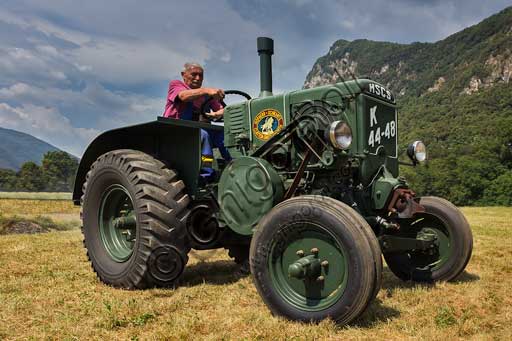 Old Tractor.Make: HSCS (Hofherr - Schrantz - Clayton - Shuttleworth)Model: K44-48Year: 1938 - 1942Fuel: crude oil and/or diesel oilNumber of Cylinders: Displacement: about 10.600 ccHorse Power: 44 HP at the wheel and 48 HP  at the PTO (Power Take-Off)Characteristics: 2-stroke diesel cycle. It had been used in the Second World War to pull the cannons, but then it was abandoned because it made too much noise and signaled the vehicle to the enemies.