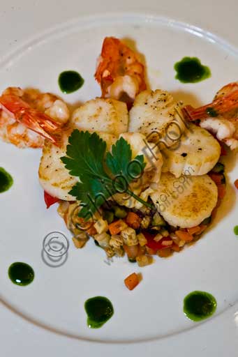  Verona, "Tre Corone, Giovanni Rana's restaurant": a plate of scallops and prawns.