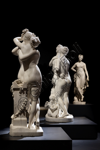  Three statuary groups: in the foreground, "The three Graces", 1812-17, by Antonio Canova (1757 - 1822), marble statue. At the centre,  "The Graces and Cupid", 1820 -22 by Bertel Thorvaldsen (1770-1844) . In the background, "Dancing Terpsichore (Dancer), 1820, di Gaetano Matteo Monti (1776 - 1847).